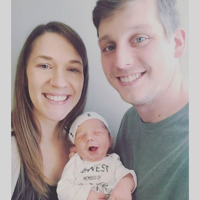 Austin and his married wife Jessica with baby