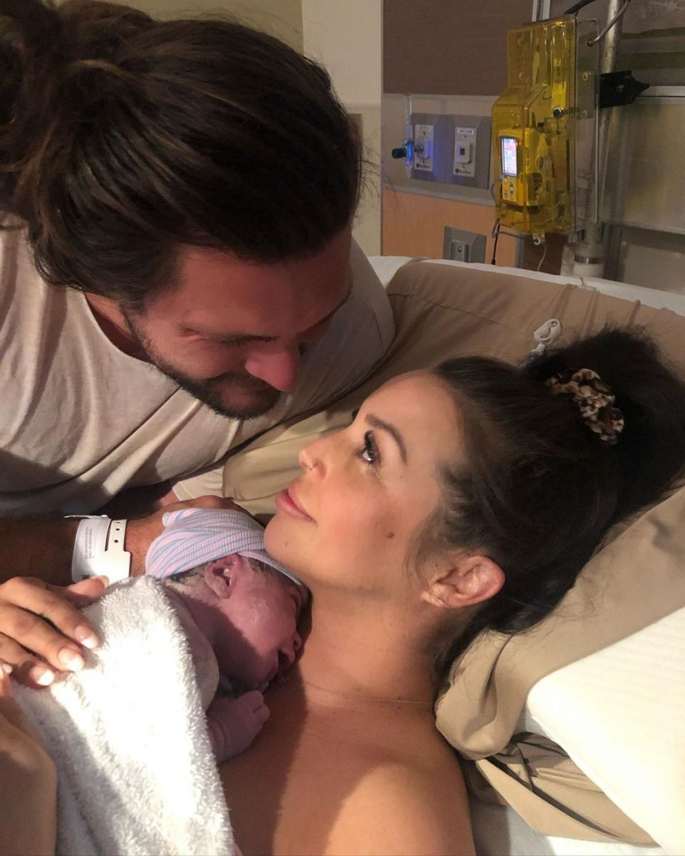 Brock Davies with his fiancee and daughter