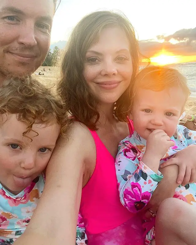 Dreama Walker with husband and children