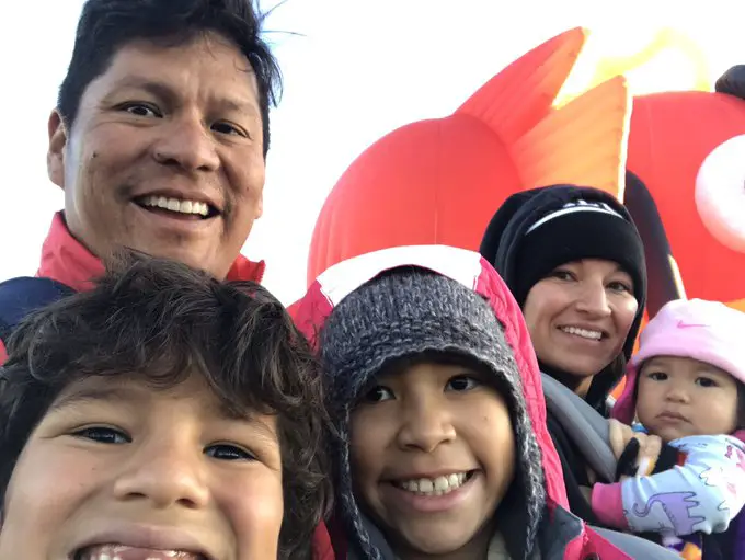 Notah Begay III with his wife and children