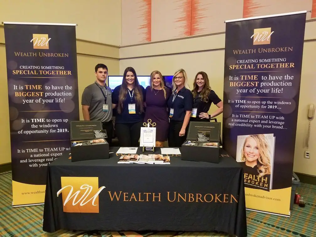 Rebecca Walser with her 'Wealth Unbroken' Book Team in 2019